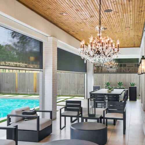 exterior solar screens on outdoor living area next to pool what's trending in drapes and blinds