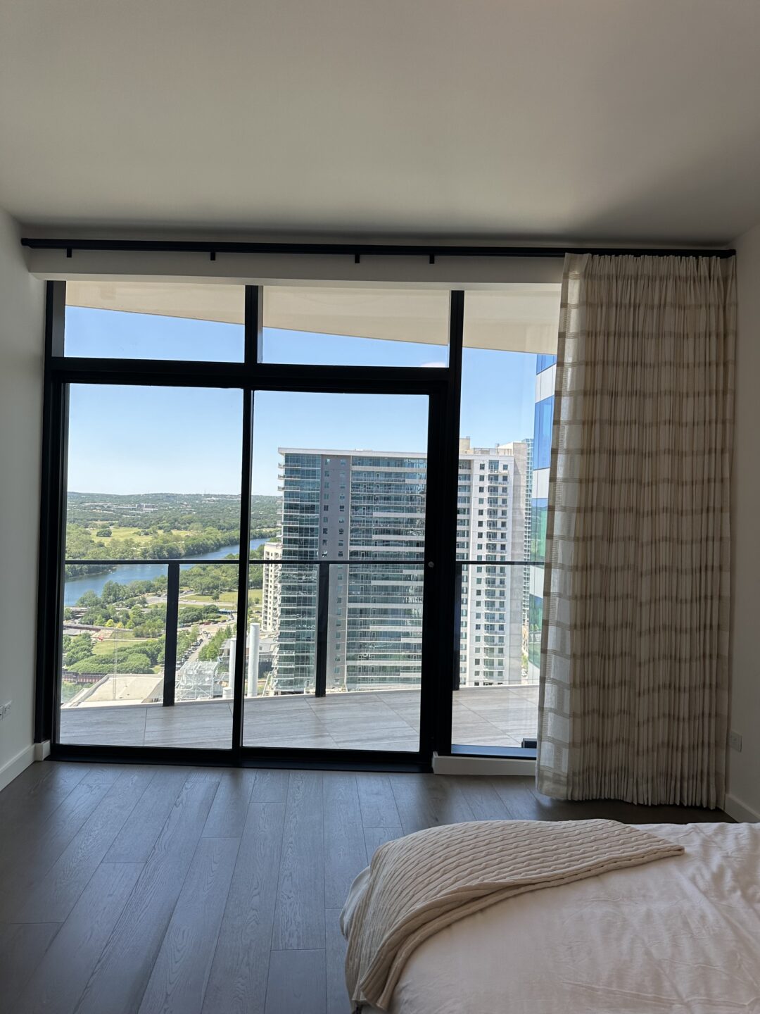 Image showcasing Window Treatments for Luxury Condos - Austintatious Blinds and Shutters